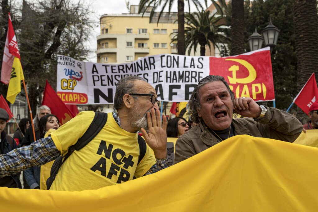 People participate in a national protest the Chilean pension system in Valparaiso, Chile, on July 23, 2023. © Eduardo Hidalgo/ZUMA/Shutterstock