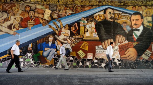 A mural defending education for all in Mexico City. © Frédéric Soltan/Corbis/Getty