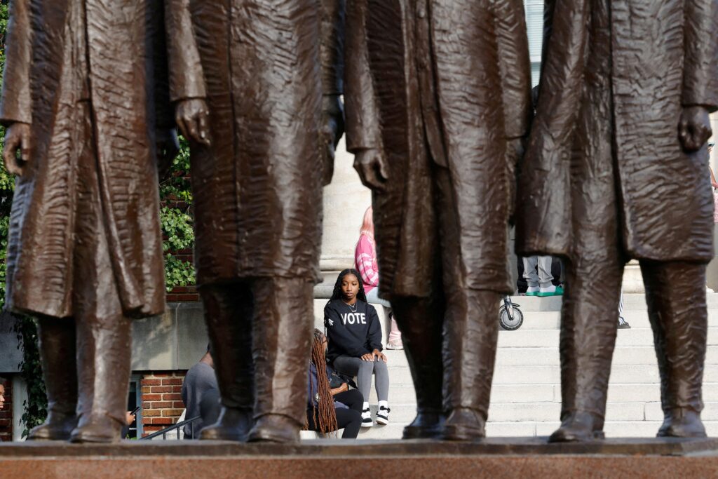 A student at North Carolina A&T State University waits in line to cast her ballot during early voting in Greensboro, North Carolina, on October 28, 2024. © Jonathan Drake/Reuters/Redux